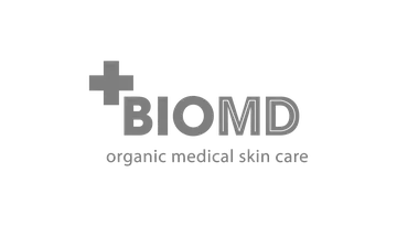 Logo with a medical cross symbol followed by the text BIOMD and the tagline 'organic medical skin care'.